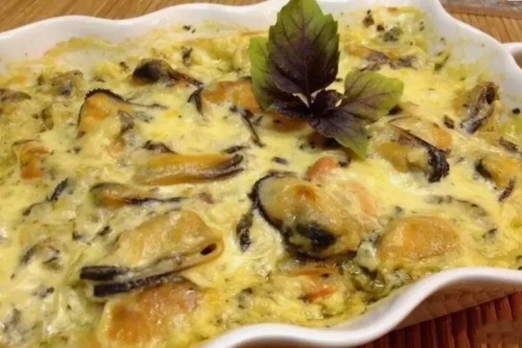 Mejillones en salsa cremosa de ajo al horno