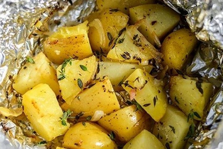 Potatoes with Mayonnaise in Foil on Coals