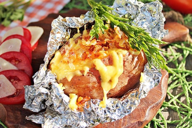 Potatoes with Cheese in Foil on Coals