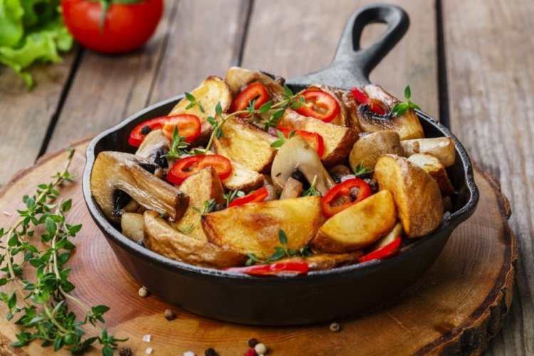 Fried Potatoes with Mushrooms, Vegetables, and Bacon