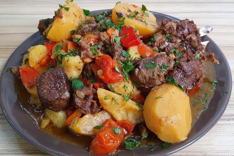 Beef with Potatoes and Pomegranate Juice in an Afghan Kazan