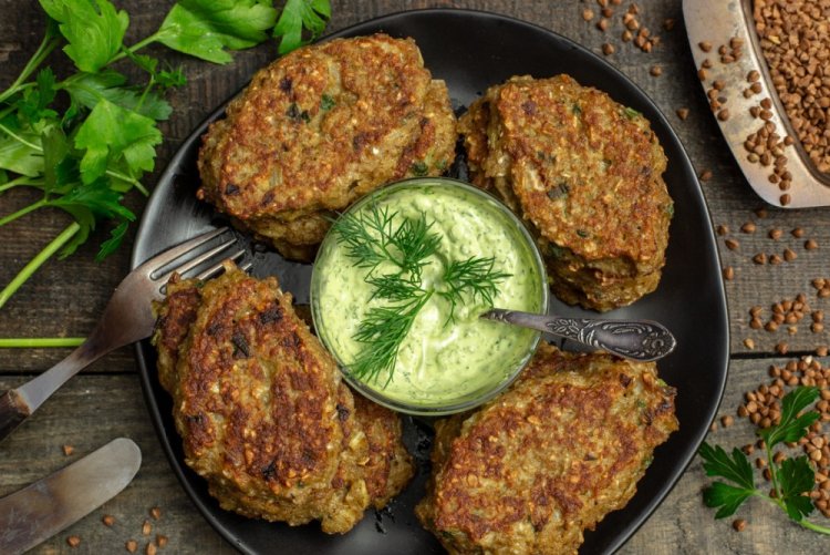 Buckwheat Cutlets on a Baking Sheet in the Oven