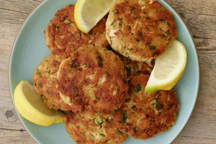 Canned Tuna Cutlets on a Baking Sheet in the Oven