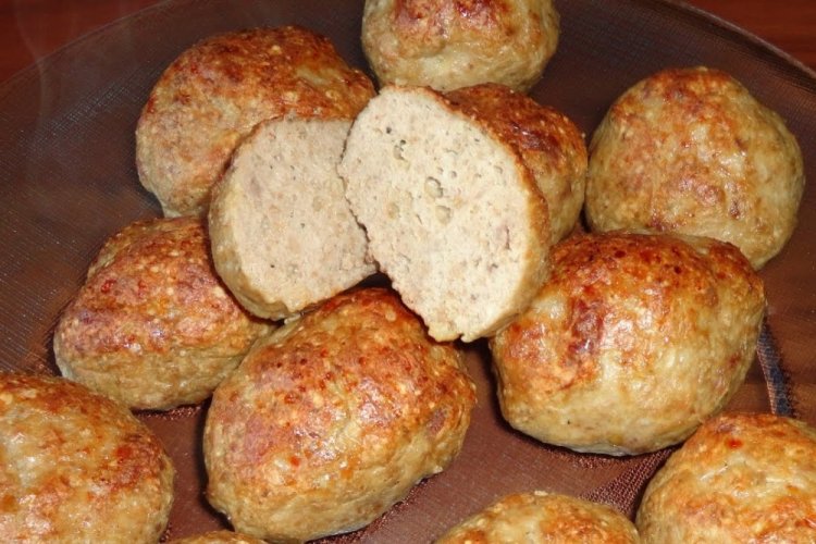 Chicken Cutlets on a Baking Sheet in the Oven