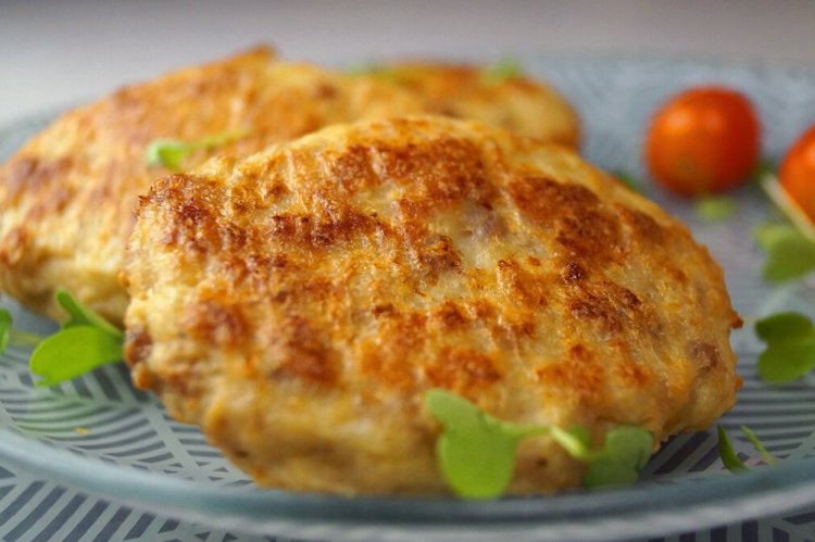 Cabbage Cutlets on a Baking Sheet in the Oven