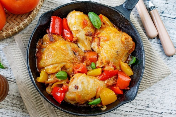 Chicken Thighs with Vegetables in a Skillet