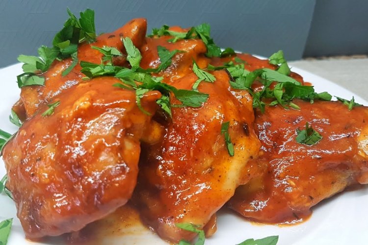 Chicken Thighs with Gravy in a Skillet