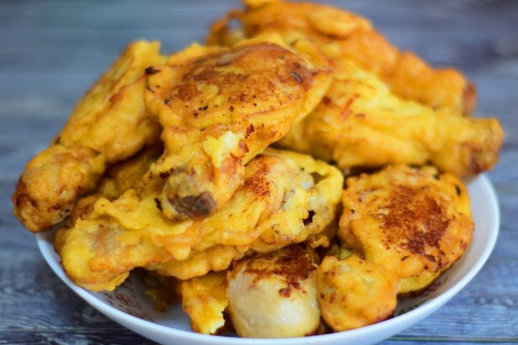 Muslos de pollo rebozados en crema en sartén