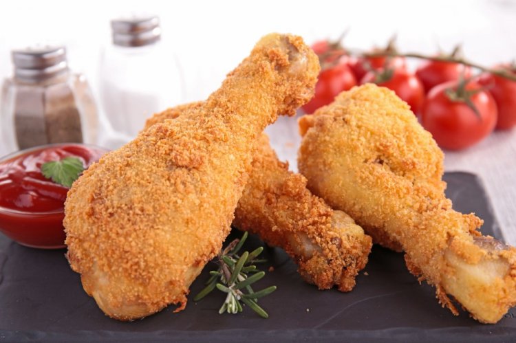 Muslos de pollo en empanado clásico