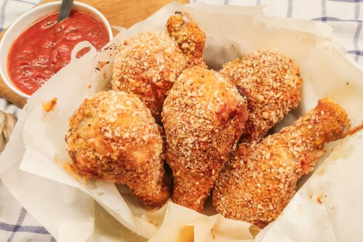 Muslos de pollo en empanado de avena en sartén