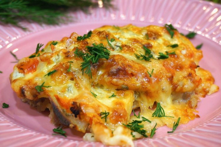 Meat with Potatoes under Cheese in the Oven