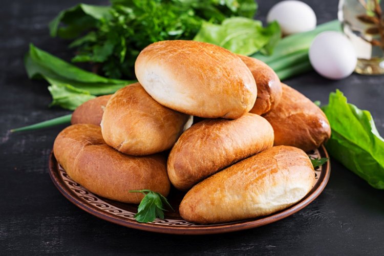 Baked Sorrel Pies with Yeast Dough