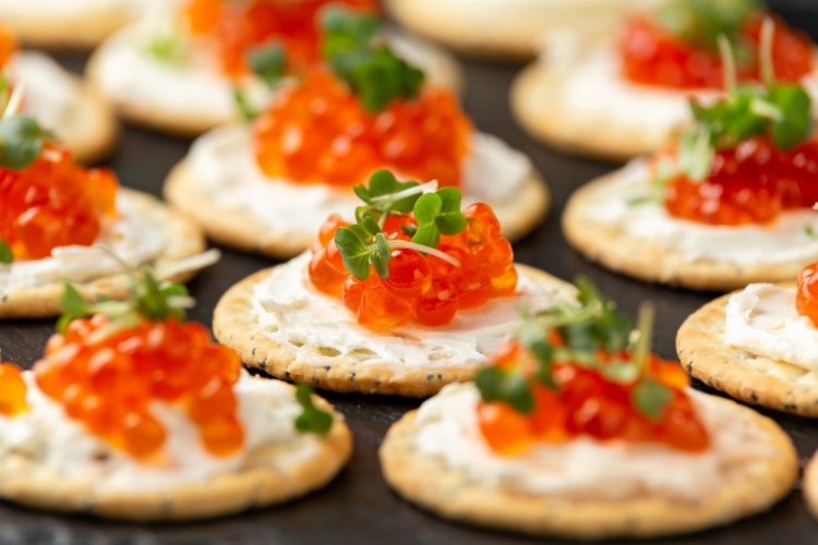 Crackers with Cheese and Red Caviar