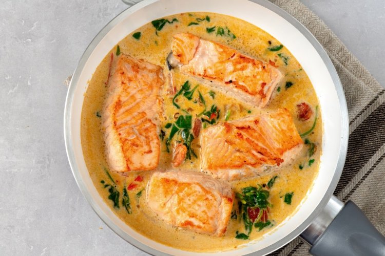 Trout Steaks with Cream Sauce in a Pan
