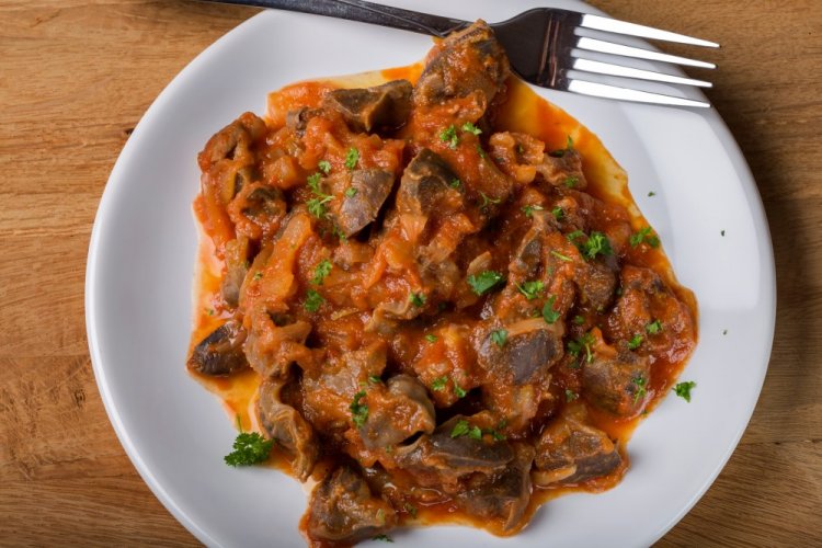 Chicken Liver in Tomato-Sour Cream Sauce in a Skillet