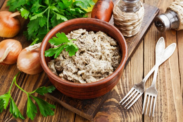 Chicken Liver in Sour Cream with Cheese in a Skillet