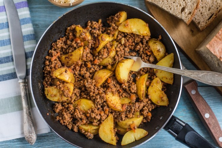 Fried Potatoes with Minced Meat in a Skillet