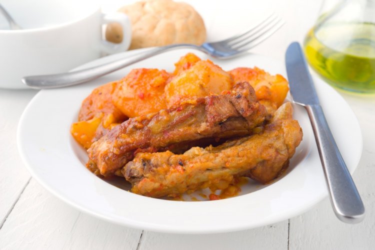 Pork Ribs with Potatoes and Tomato in an Afghan Kazan
