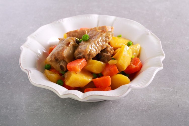 Pork Ribs with Vegetables and Dried Fruits in an Afghan Kazan