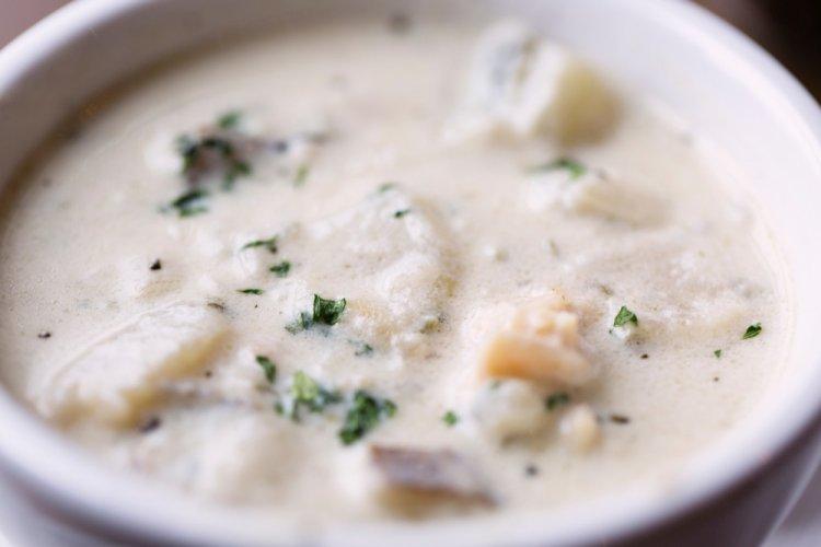 Pollock with Sour Cream and Mayonnaise in a Skillet