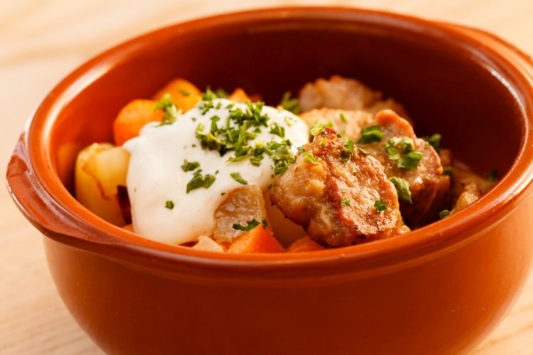 Potatoes with Meat and Sour Cream in Pots