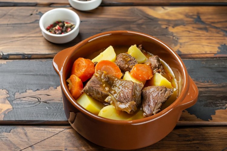 Potatoes with Meat and Tomato in Pots