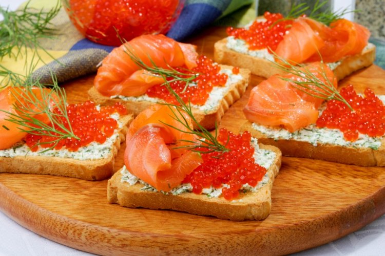 Sandwiches with Salmon and Red Caviar for New Year
