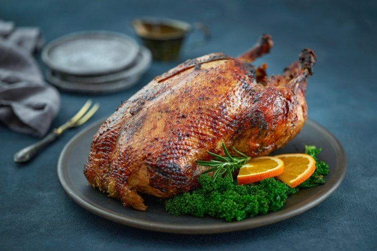 Goose with Onions and Celery in the Oven