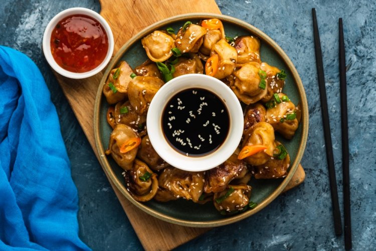 Air Fryer Fried Dumplings with Soy Sauce and Sesame Seeds