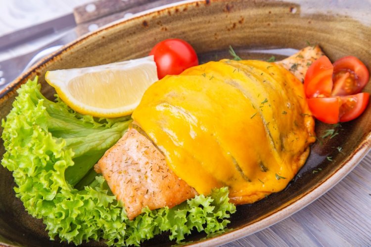 Pink Salmon Steaks with Tomatoes and Cheese in an Air Fryer