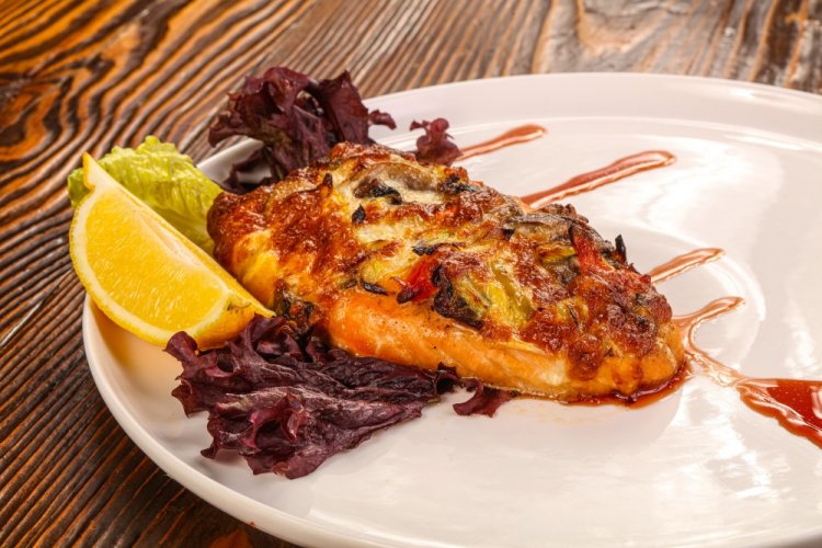Pink Salmon Steaks with Onions and Carrots in an Air Fryer