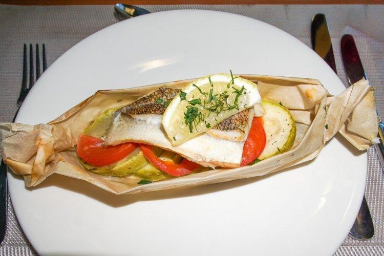Macrurus with Vegetables in Parchment in the Oven