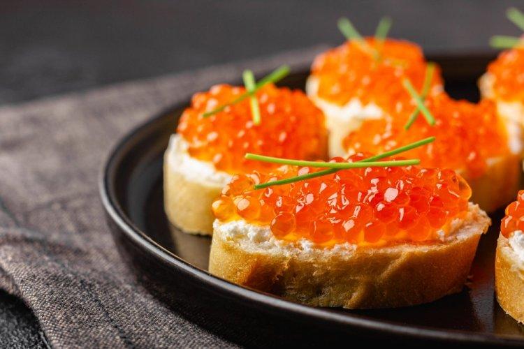 Canapés with Red Caviar, Butter, and Lemon