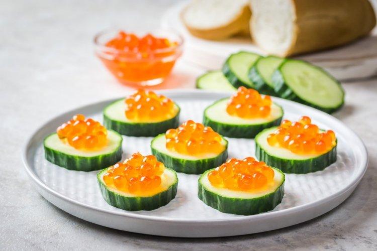 Canapés with Red Caviar and Cucumber