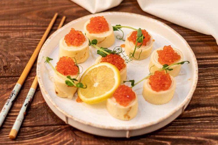 Red Caviar Canapés on Blinis
