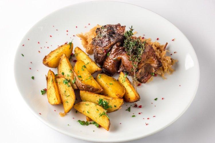 Duck Wings Baked with Potatoes in the Oven
