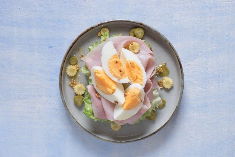 Bruschettas with Avocado, Ham, and Quail Eggs