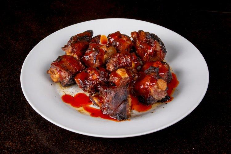 Pork Tails in Sweet and Sour Sauce