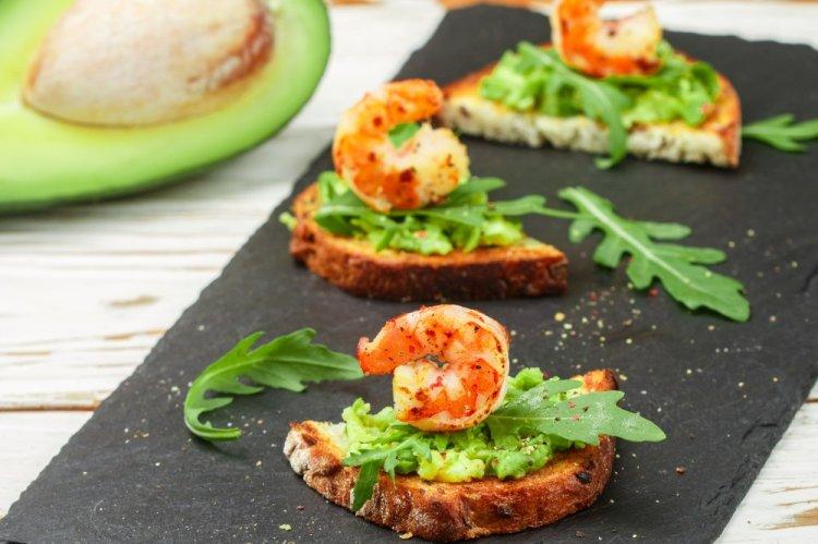 Bruschetta with Shrimp, Avocado, and Arugula