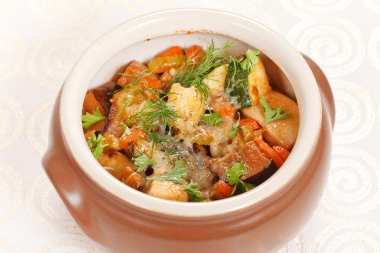 Chicken Thighs Baked with Potatoes in Clay Pots