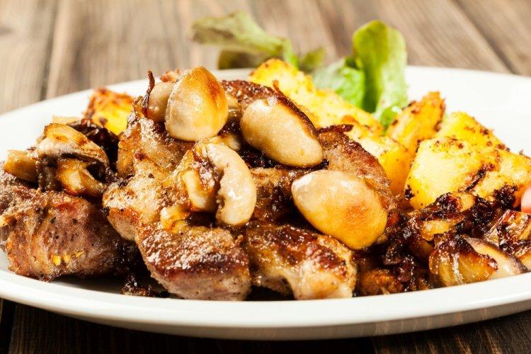 Pork Loin with Potatoes and Mushrooms in the Oven
