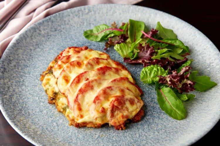 Pork Loin with Tomatoes and Cheese in the Oven