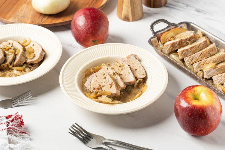 Pork Loin with Onions and Apples in a Frying Pan