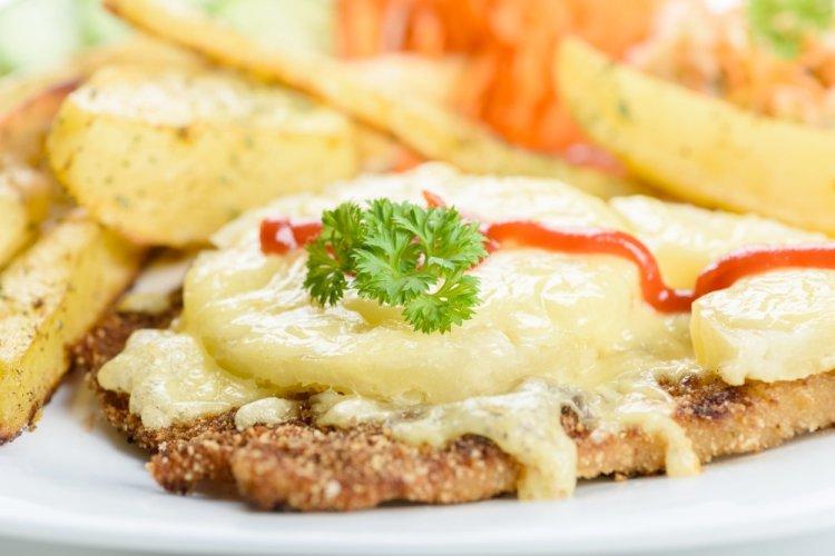 Pork Loin Baked with Pineapples and Cheese