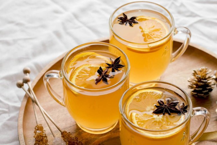 Vino caliente blanco con mandarinas